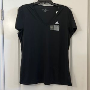 Black check performance material shirt.